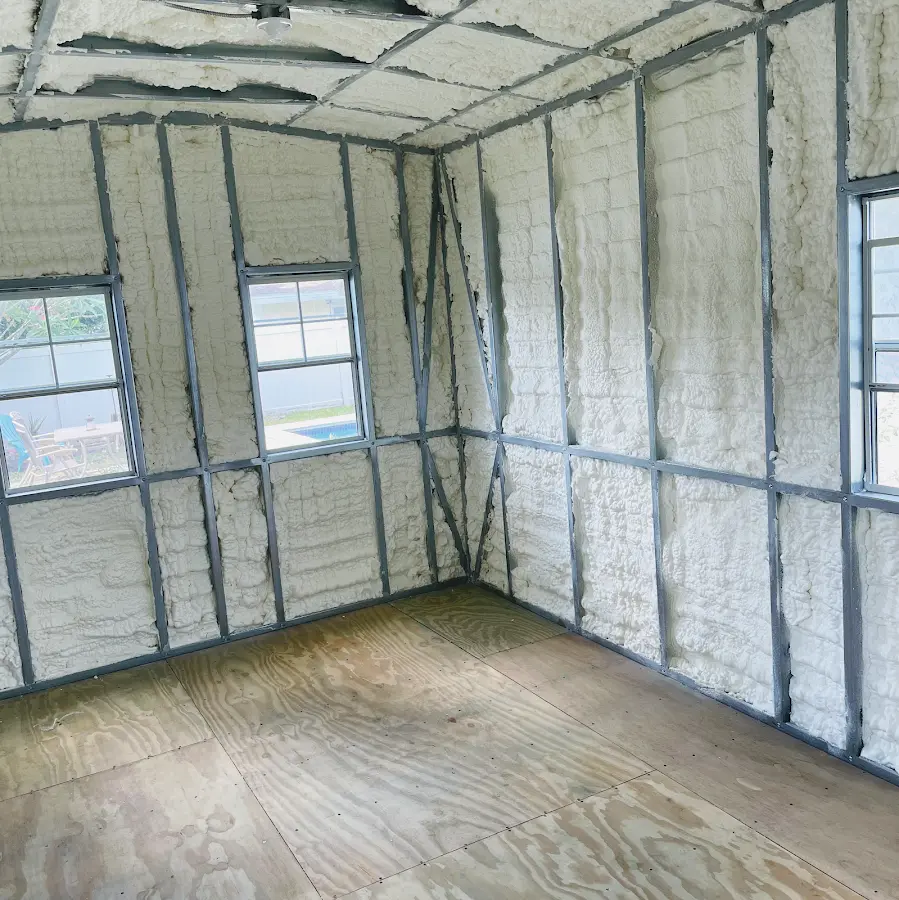 Closed-cell spray foam insulation applied to wall cavities in a residential project in Fort Belvoir